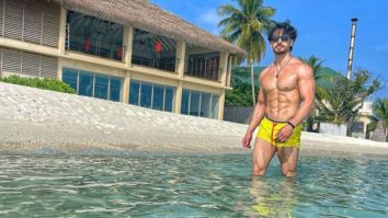 Tiger Shroff flaunts his taut muscles in yellow shorts