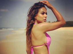 Nia Sharma looks smoking hot in a pink monokini as she soaks in ‘vitamin sea’