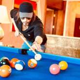 Shah Rukh Khan gives a glimpse of his Pathan look for the first time while playing a game of pool