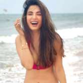 Sonal Chauhan sets the temperature soaring in pink and white bikini while spending time in Goa 