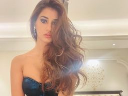 Disha Patani looks like a sultry beauty dressed in a bodycon dress with a thigh-high slit