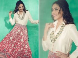 Madhuri Dixit gives modern contemporary feels by pairing a satin shirt with red lehenga skirt