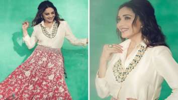 Madhuri Dixit gives modern contemporary feels by pairing a satin shirt with red lehenga skirt