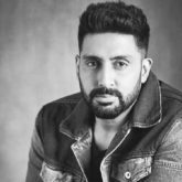 Abhishek Bachchan’s befitting reply to a user asking him to do more than sending virtual hugs wins the internet