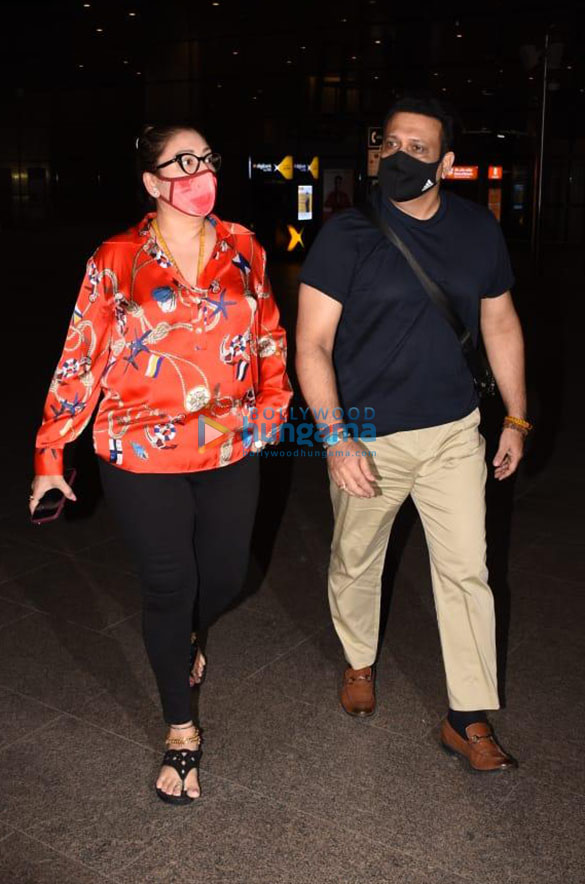 photos govinda and wife sunita ahuja snapped at the airport 2