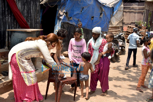 photos payal ghosh provides food to needy people in versova 3