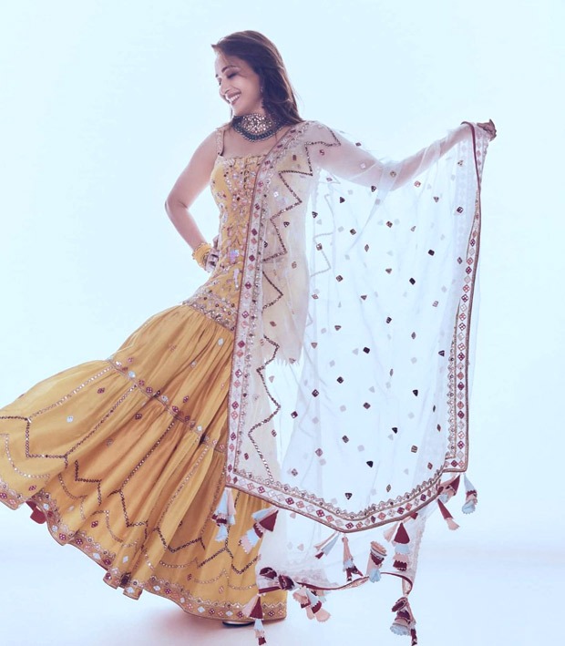 Madhuri Dixit is a ray of sunshine in embellished strappy kurta and gharara worth Rs. 65,000 Madhuri Dixit is a ray of sunshine in embellished strappy kurta and gharara worth Rs. 65,000