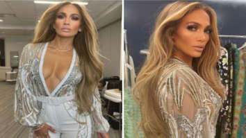 Jennifer Lopez is a vision in plunging neckline top and white pants at Vax Live concert by Global Citizen