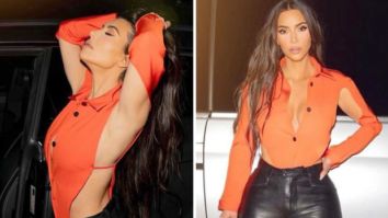 Kim Kardashian raises oomph factor in risky cut-out orange top and leather pants