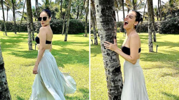 Mandana Karimi raises the summer heat in strapless bra and high-waist skirt