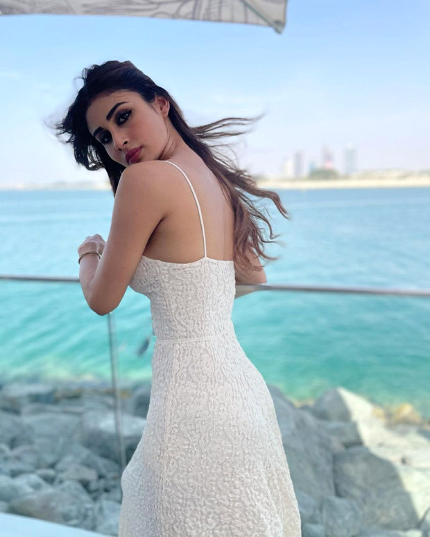 Mouni Roy looks pristine in summery strappy white midi dress