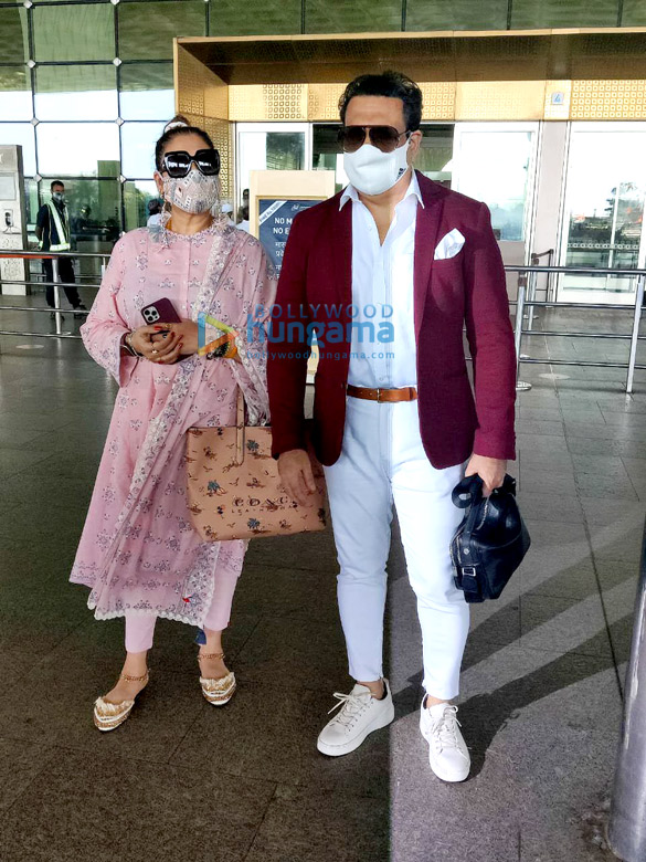 photos govinda and wife sunita ahuja snapped at the airport 2 2