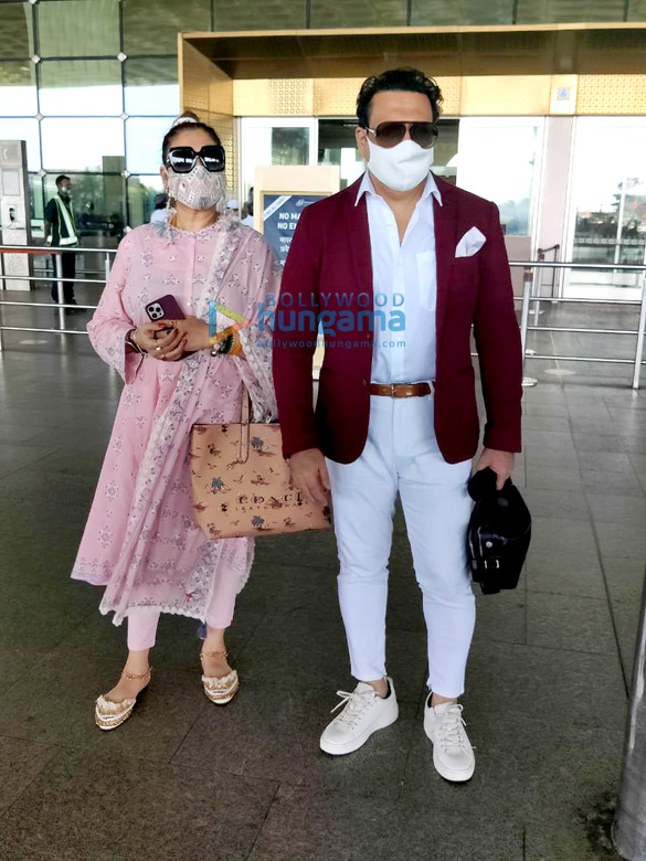 photos govinda and wife sunita ahuja snapped at the airport 3 2