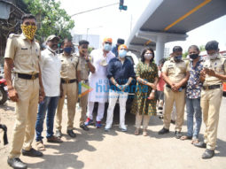 Photos: Mika Singh, Vindu Dara Singh and Bhoomi Trivedi snapped distributing food to needy people at Goregaon