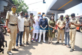 Photos: Mika Singh, Vindu Dara Singh and Bhoomi Trivedi snapped distributing food to needy people at Goregaon