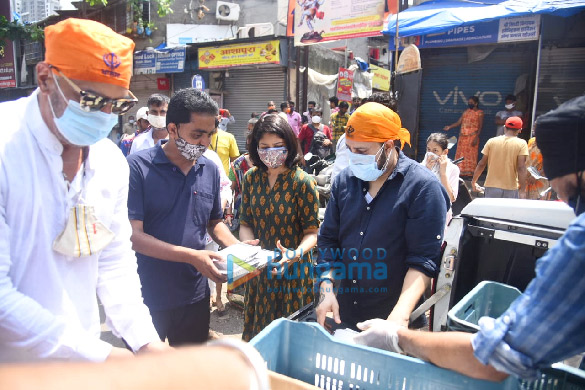 photos mika singh vindu dara singh and bhoomi trivedi snapped distributing food to needy people at goregaon 3