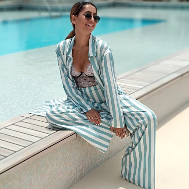 Anusha Dandekar adds oomph to her look, pairs a striped pantsuit with lacy bustier 