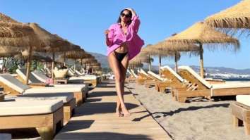 Banita Sandhu sizzles in sunkissed pictures donning black bikini and pink shirt