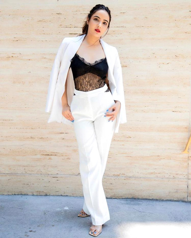 Jasmin Bhasin looks fiery in white pantsuit paired with black lace bralette 