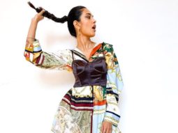 Sarah Jane Dias pairs a printed dress with a bustier and ankle length boots