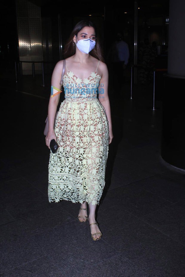Tamannaah Bhatia arrives in Mumbai in H&M lime yellow lace dress worth Rs. 8237 Tamannaah Bhatia arrives in Mumbai in H&M lime yellow lace dress worth Rs. 8237