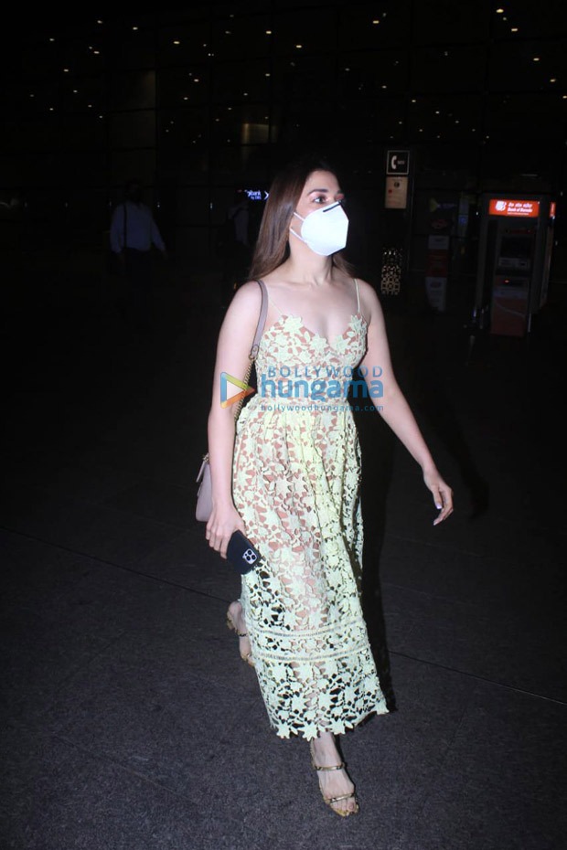 Tamannaah Bhatia arrives in Mumbai in H&M lime yellow lace dress worth Rs. 8237 Tamannaah Bhatia arrives in Mumbai in H&M lime yellow lace dress worth Rs. 8237