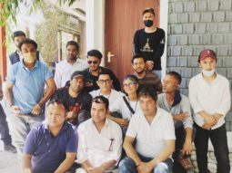 Aamir Khan and Kiran Rao pose together with a group of people on sets of Laal Singh Chaddha in Kargil