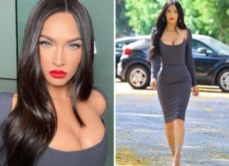 Megan Fox hops onto regencycore fashion with modern corset figure-hugging ash grey dress by Alex Perry paired with strappy stilettos