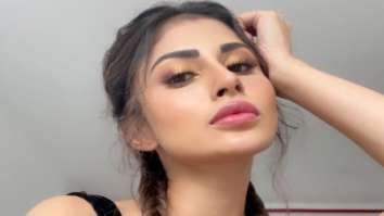 Mouni Roy aces soft glam look, ties her hair in French braids