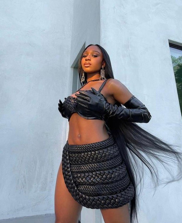 Normani shows her 'Wild Side' in sultry braided leather bralette and mini skirt with waist-high slit Normani shows her 'Wild Side' in sultry braided leather bralette and mini skirt with waist-high slit