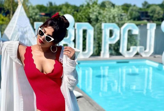 Priyanka Chopra enjoys sunny London weather in red plunging neckline swimsuit as Nick Jonas organises birthday party