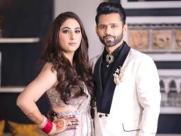Rahul Vaidya keeps it sharp in black and white suit, Disha Parmar dons shimmery sareer from Dolly J studio for their wedding reception