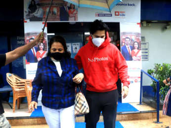 Photos: Varun Dhawan snapped with his mother at a bank in Santacruz