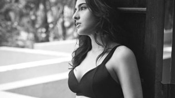Sara Ali Khan poses in an all-black bralette and thigh-high slit skirt for her latest photoshoot