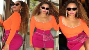 Beyoncé gives major colour blocking lessons as she pairs a tangerine top with a hot pink skirt