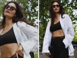 Gabriella Demetriades stuns in a white t-shirt and black denims