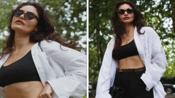 Gabriella Demetriades stuns in a white t-shirt and black denims