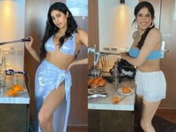 Janhvi Kapoor shares videos while struggling with a juice squeezer in a hot blue bikini top and shimmery thigh-high slit sarong