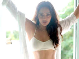 Neha Sharma looks drop dead gorgeous in an all-white bikini