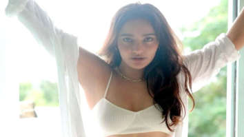 Neha Sharma looks drop dead gorgeous in an all-white bikini