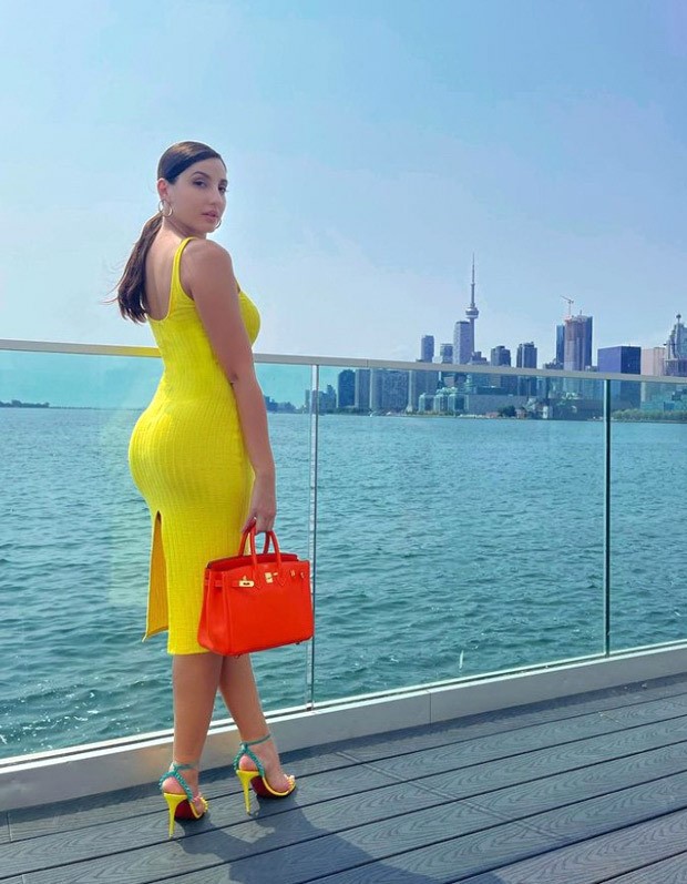Nora Fatehi sizzles in bright yellow dress along with uber luxurious Birkin bag