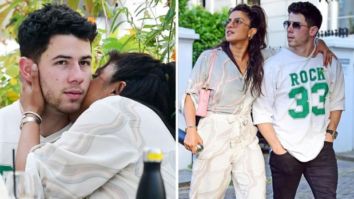 Priyanka Chopra and Nick Jonas cuddle up as they take a stroll on the streets of London