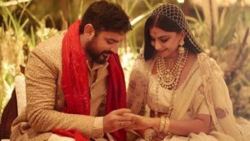 Rhea Kapoor shares her first wedding picture with her husband Karan Boolani donning ivory Anamika Khanna lehenga