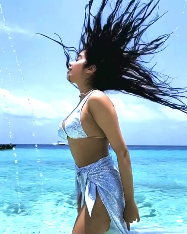 Janhvi Kapoor shares the most filmy beach video in a sexy sequined bikini top with a matching sarong