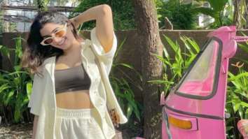 Khushi Kapoor soaks in the sun in yellow overlay and shorts paired with crop top