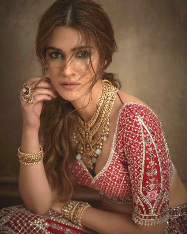 Kriti Sanon is beguiling beauty in a red embellished lehenga for Peacock magazine