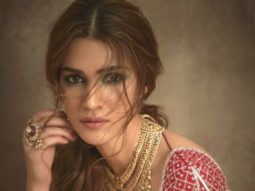 Kriti Sanon is beguiling beauty in a red embellished lehenga for Peacock magazine