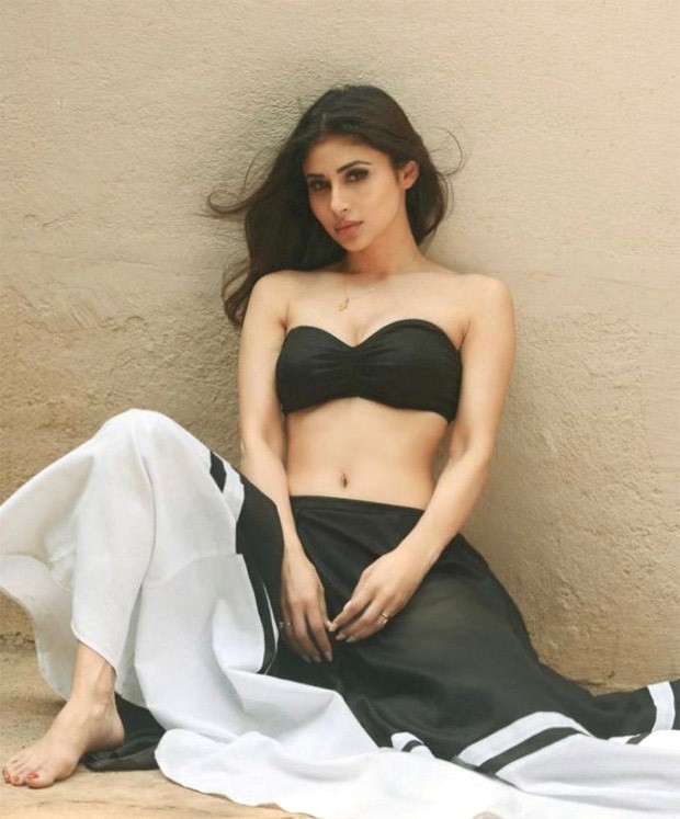 Mouni Roy sizzles in an easy breezy black dress