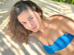 Alia Bhatt gives a killer look as she poses in a blue bikini