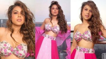 Nia Sharma stands out in an all-pink outfit; the metallic and shimmer elements add the perfect twist to her desi look